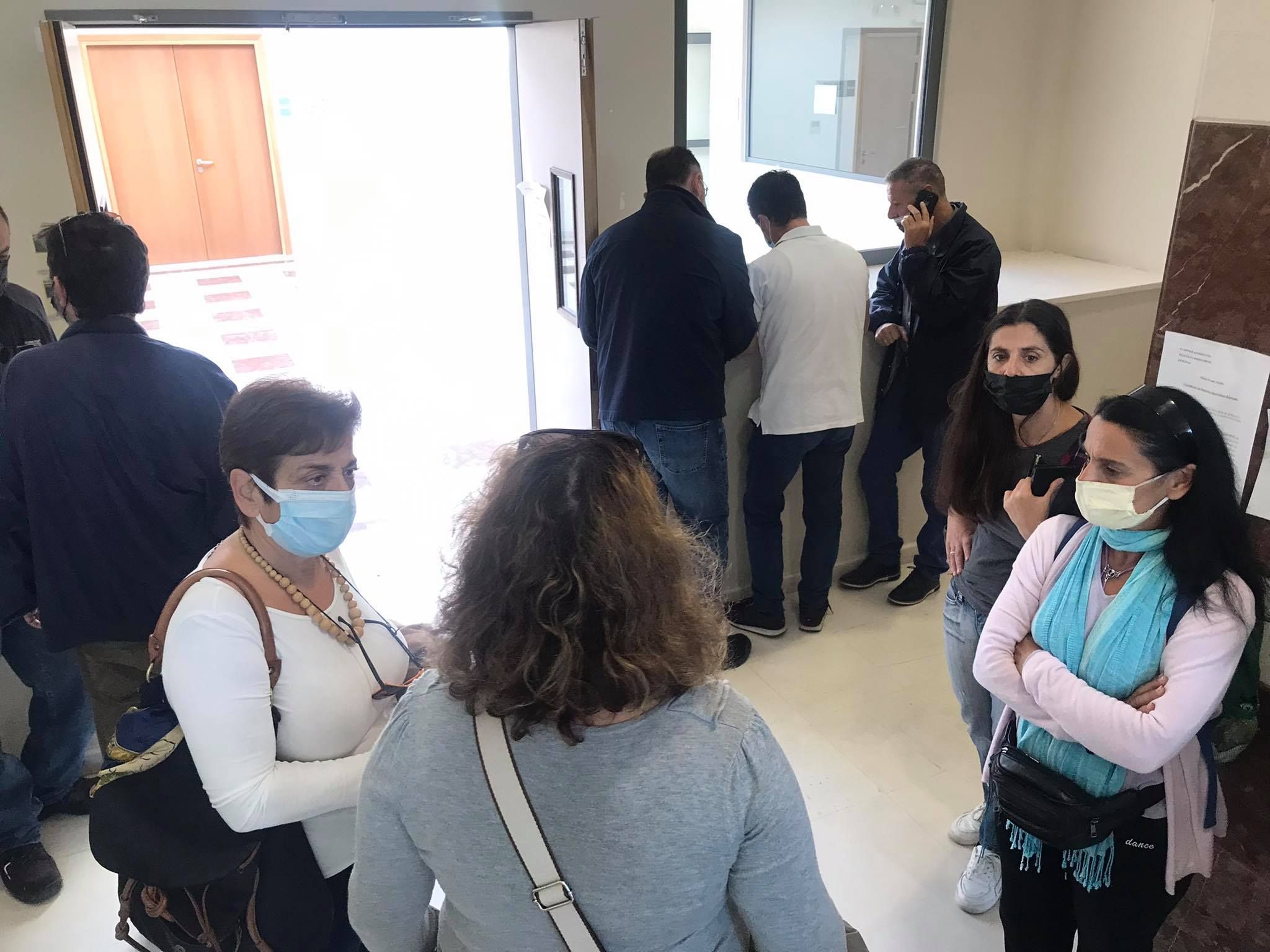 Parents at Prosecutor΄s office regarding lawsuit they filed for Vocational High School vandalism