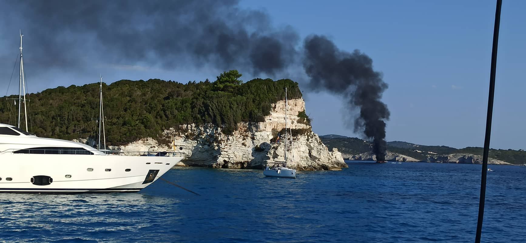 Yacht on fire between Paxos and Antipaxos